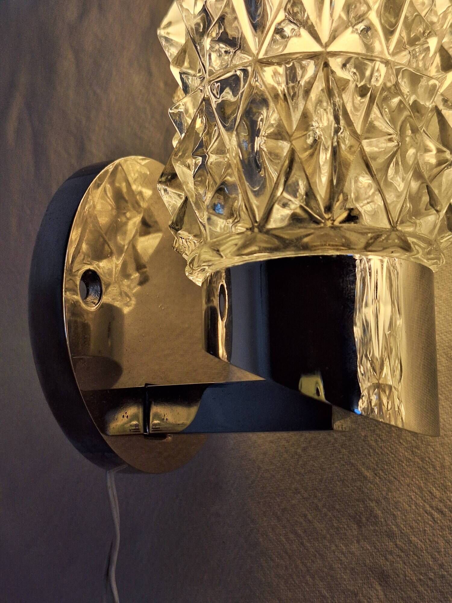 Pair of vintage Art Deco space age chrome and molded glass wall sconces
