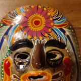 Mexican mask from the 1970s, hand-painted on terracotta.