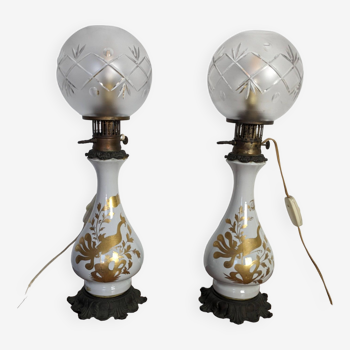 Pair of electrified ceramic and bronze oil lamps