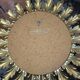 Witch's eye sun mirror in gold metal from the 60s