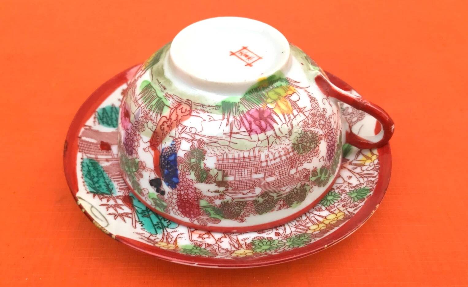 Antique tea cup and saucer with Japonisme decoration.