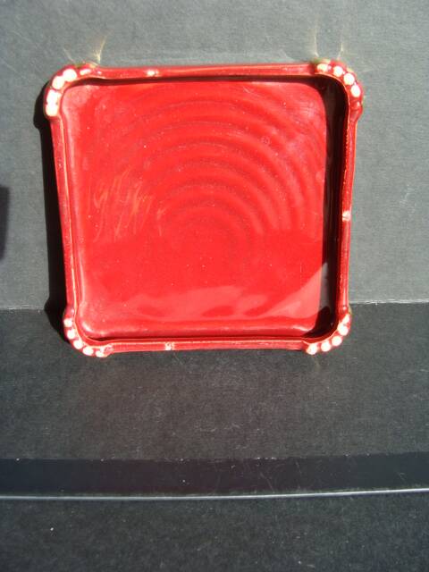 Art Deco trivet or bottle holder