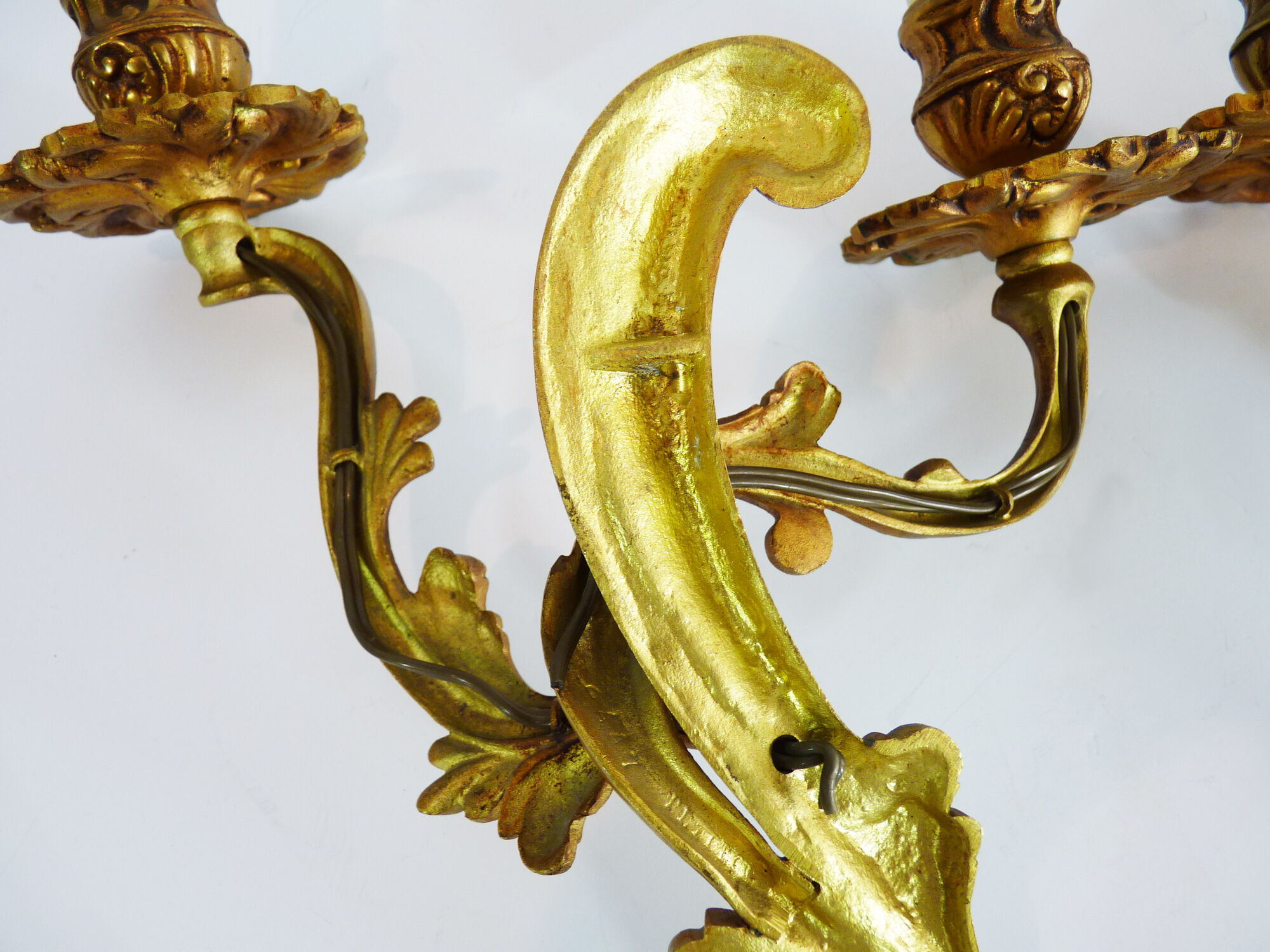 Former pair of double-light wall light in bronze or brass. Year 50 60