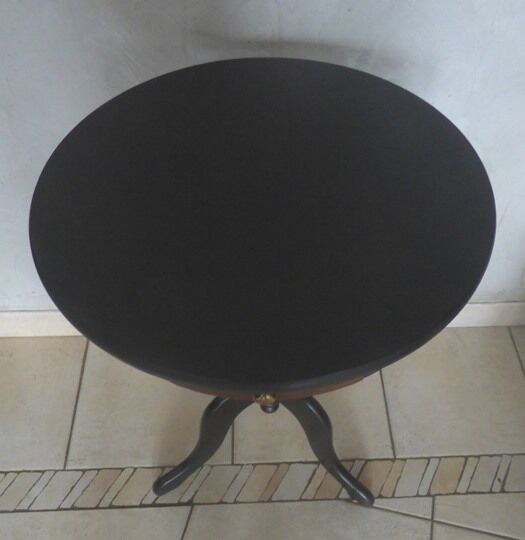 Pedestal table in mahogany style opening through a drawer