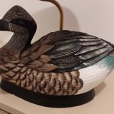 Decorative table lamp with a sculpted duck-shaped base and painted finish.