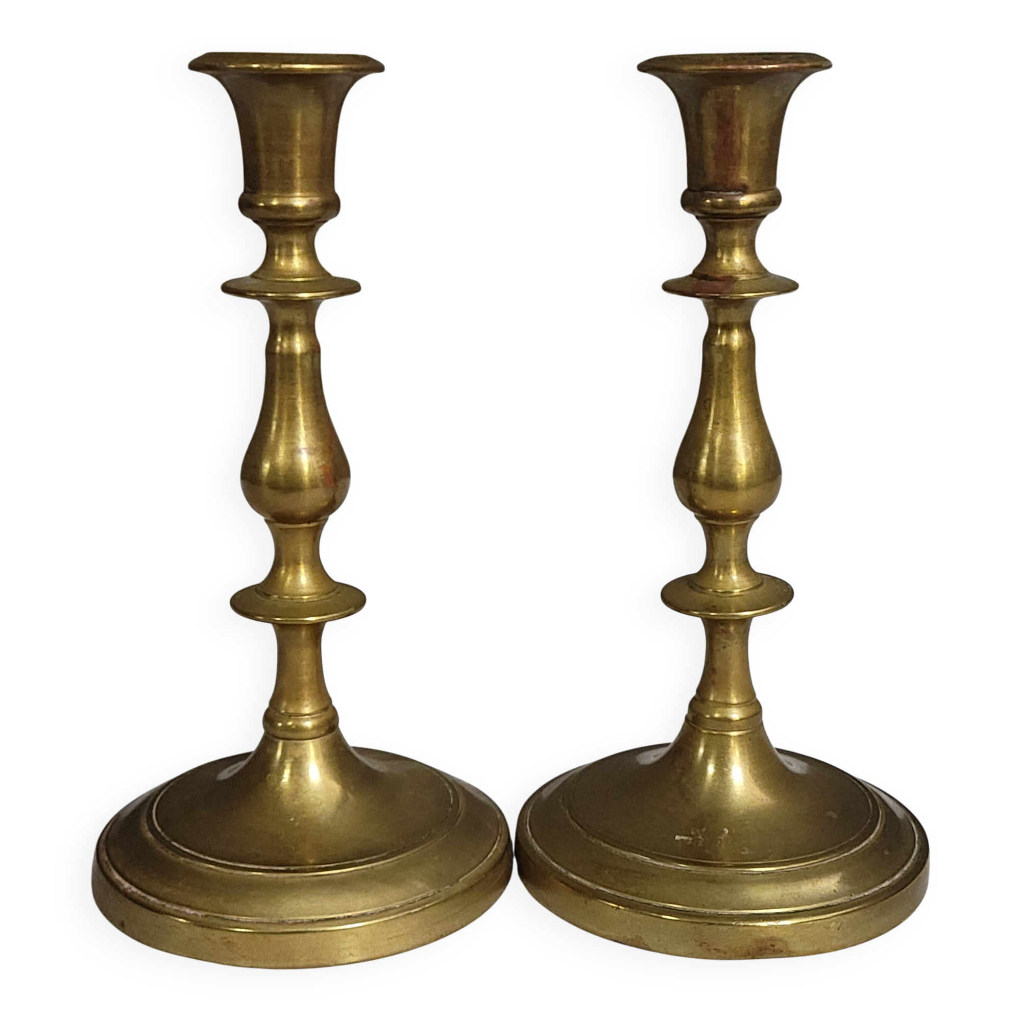 Pair of antique brass candlesticks, finely turned, dating from the 19th century