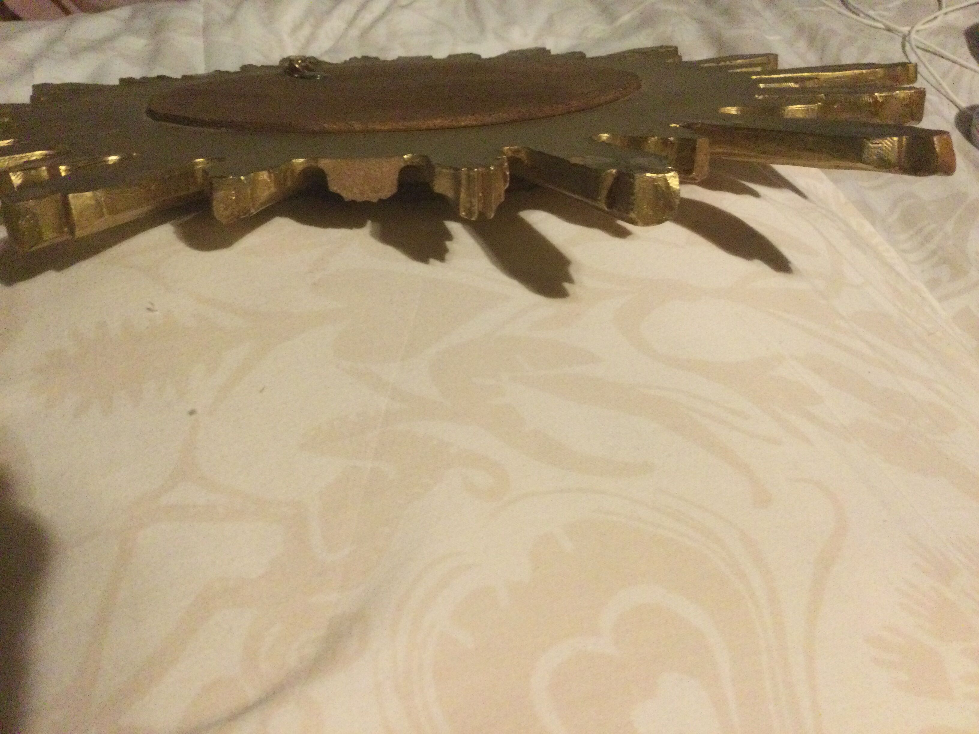 Mirror witch sun in gilded wood 57cm