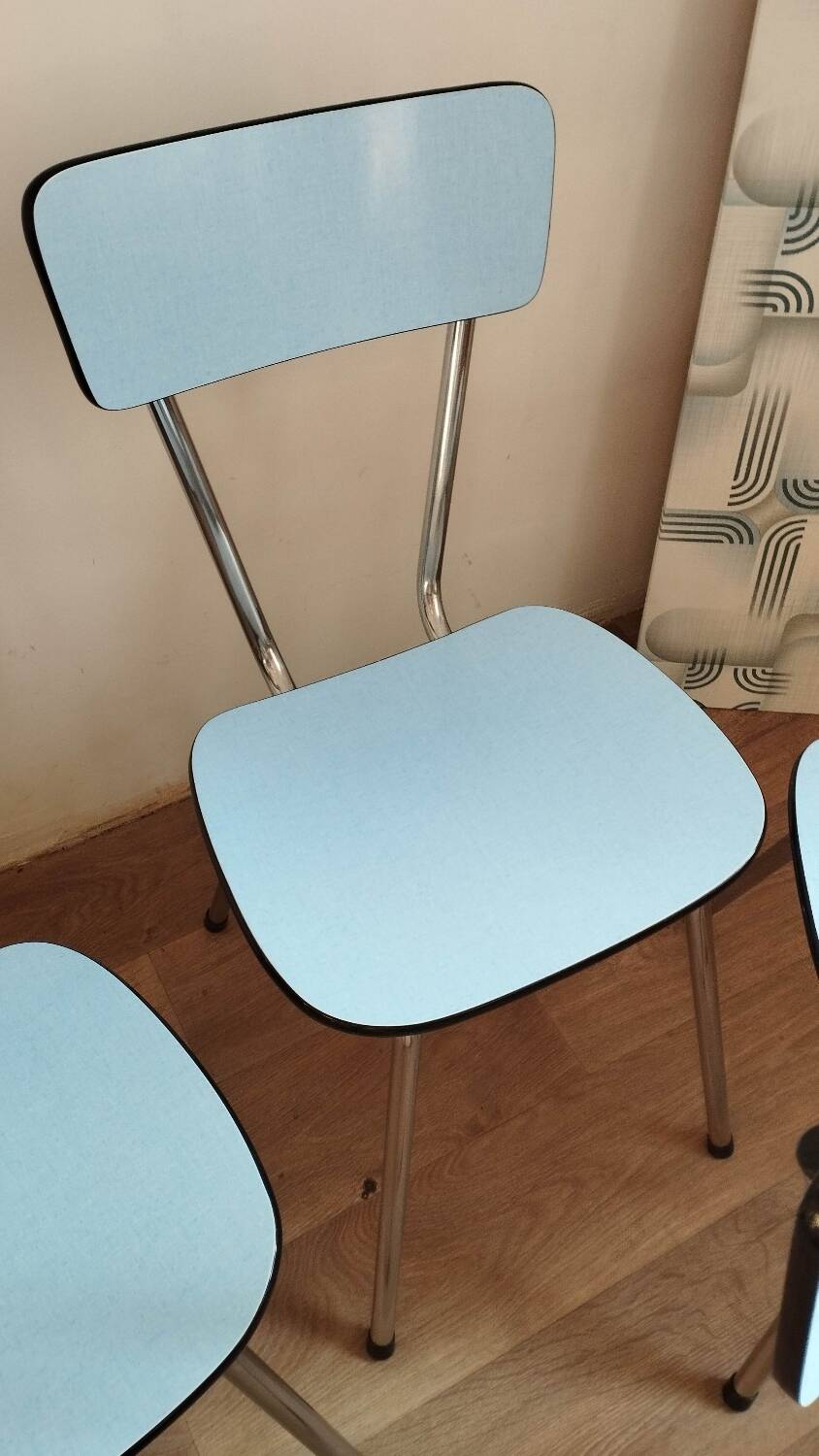 4 blue Formica chairs