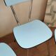 4 blue Formica chairs