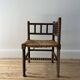 Turned wood corner chair