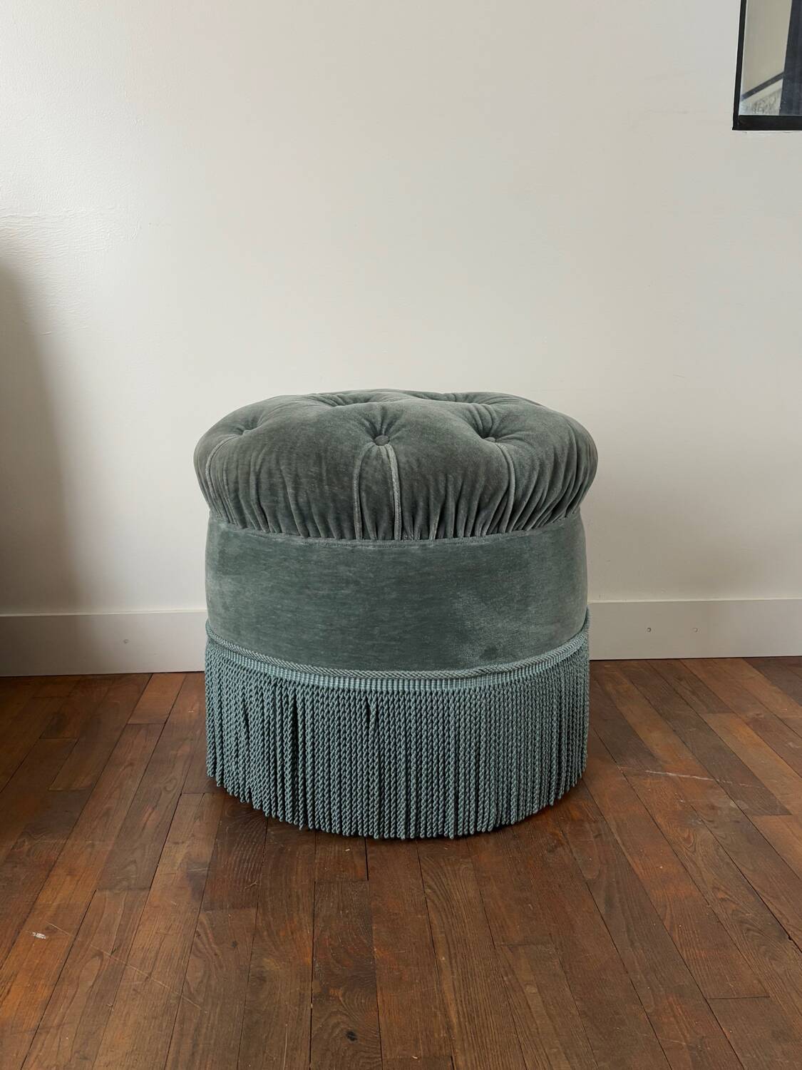 Velvet upholstered pouf