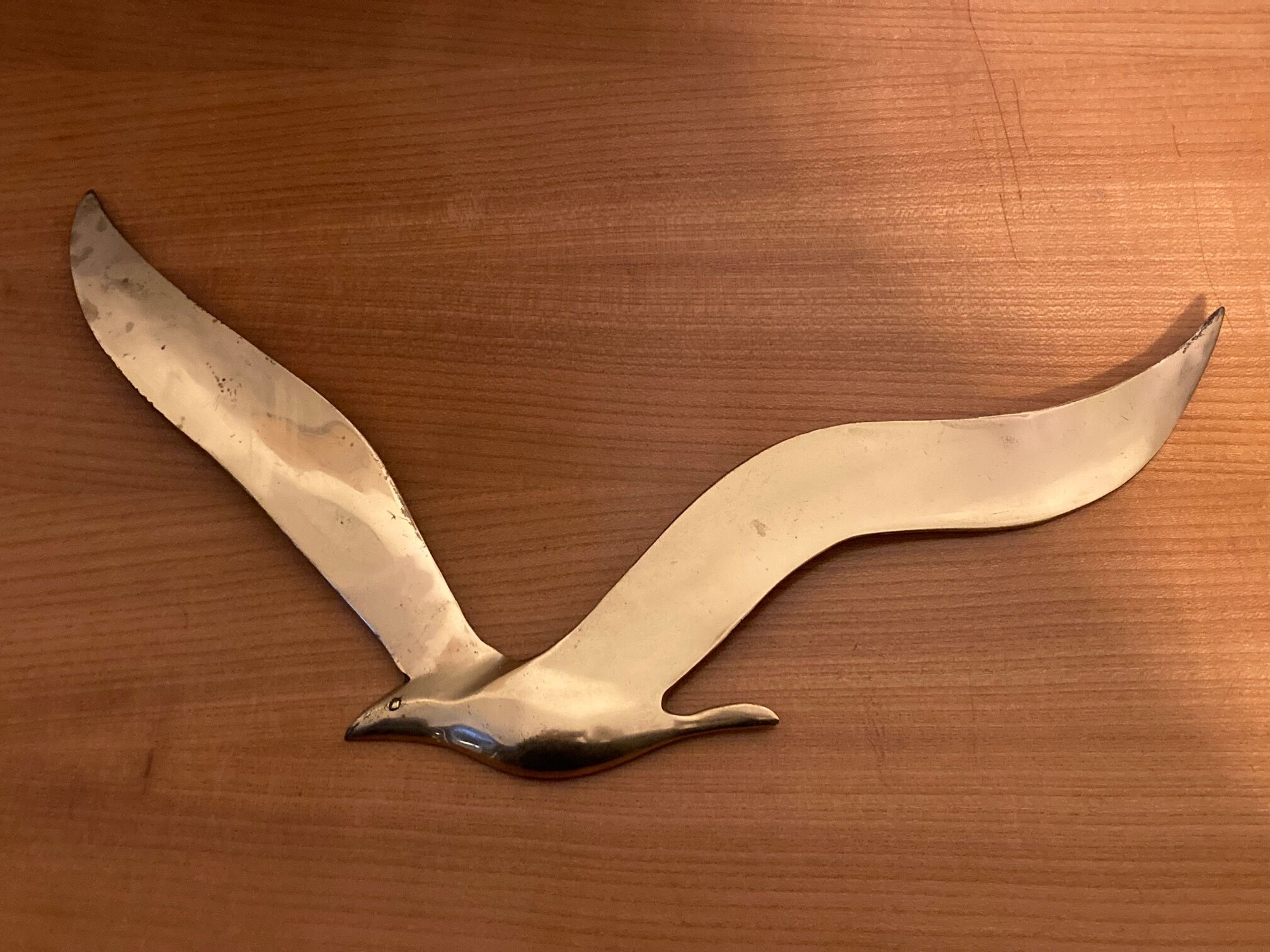 Set of two brass birds to hang