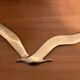 Set of two brass birds to hang