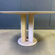 Round French travertine dining table 1970s