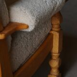 Henning Kjærnulf, lounge chairs in oak and lambswool, mid-century Danish, 1960s.