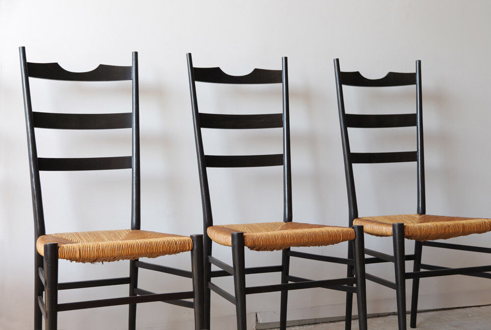 Black Italian straw chairs