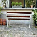 Bench in dark wood and white metal