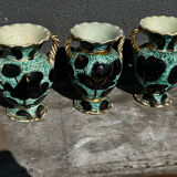 Trio of Vallauris vases in turquoise and black, highlighted with gold, 22 cm high