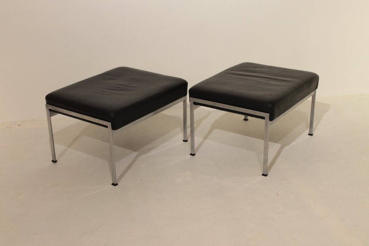 Pair of designer leather and brushed stainless steel footrests - Rob Parry