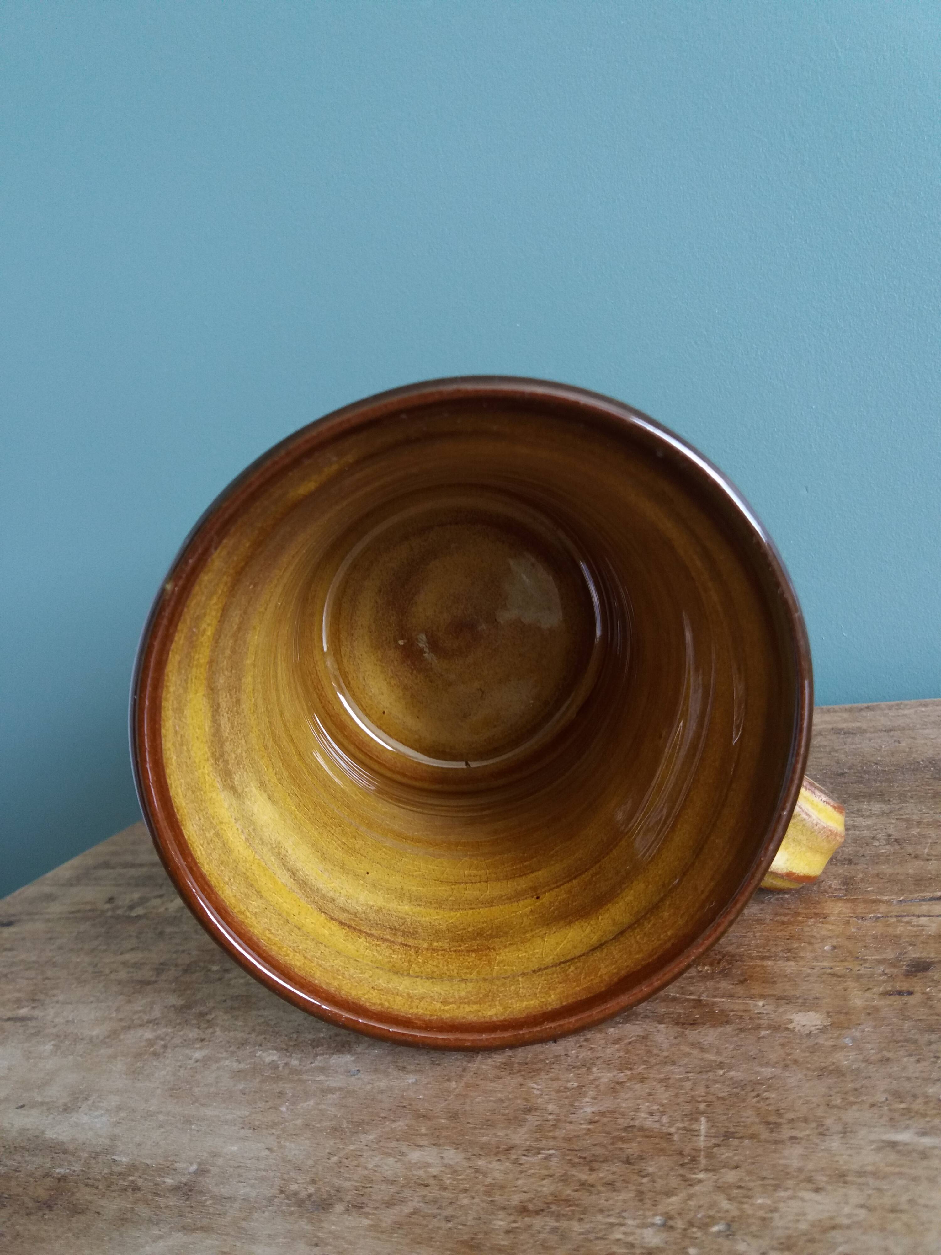 Handmade terracotta mug cup