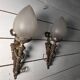Pair of torch wall lights in Louis XVI style in 19th-century bronze.