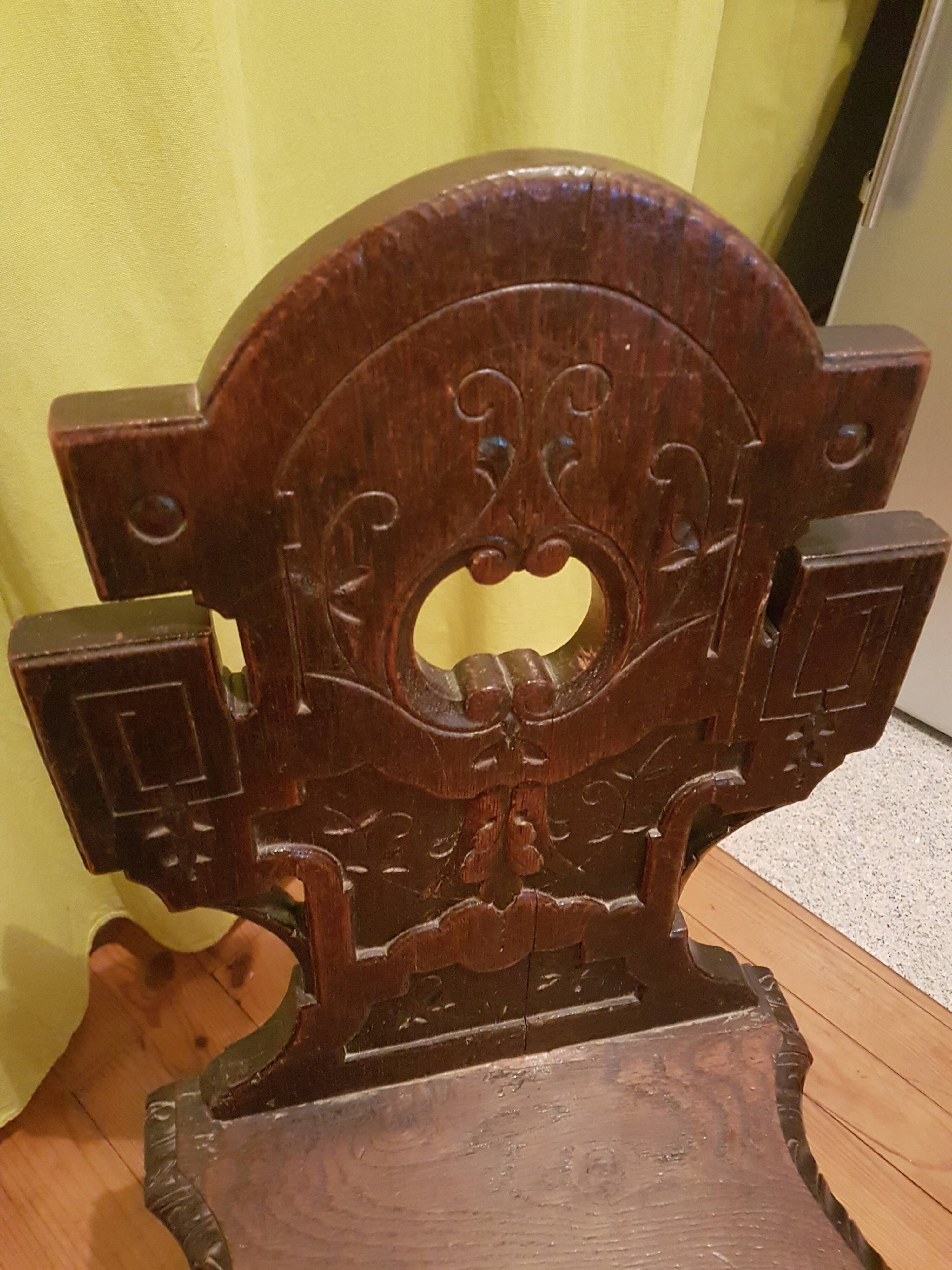 Black forest type exotic solid wood chair