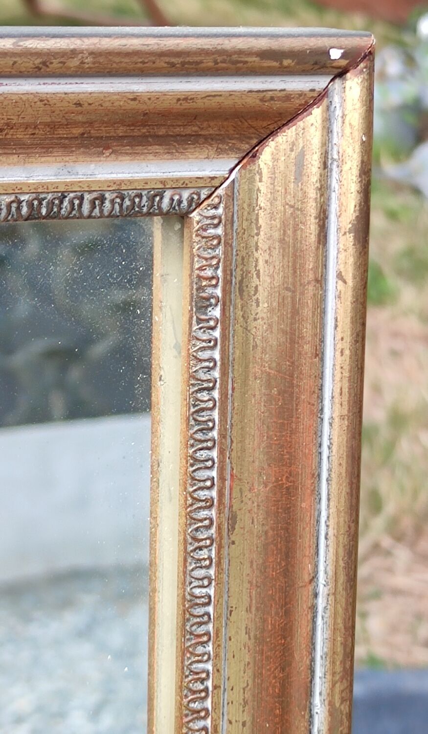 Old little gilded mirror