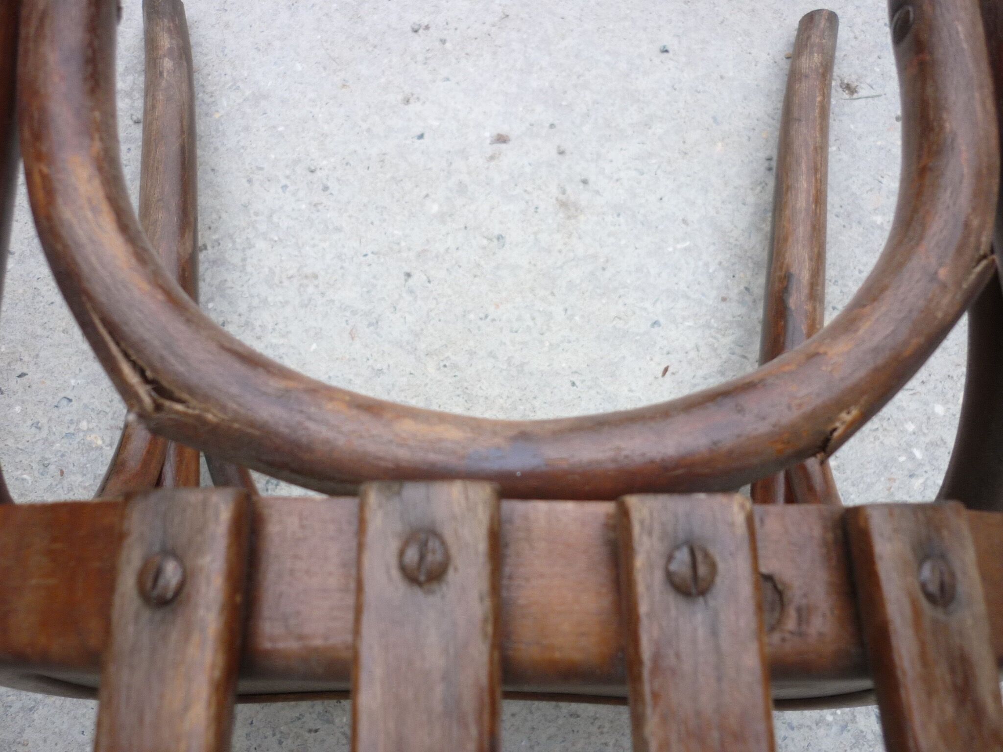 Pair of old bistro chairs with dark patina