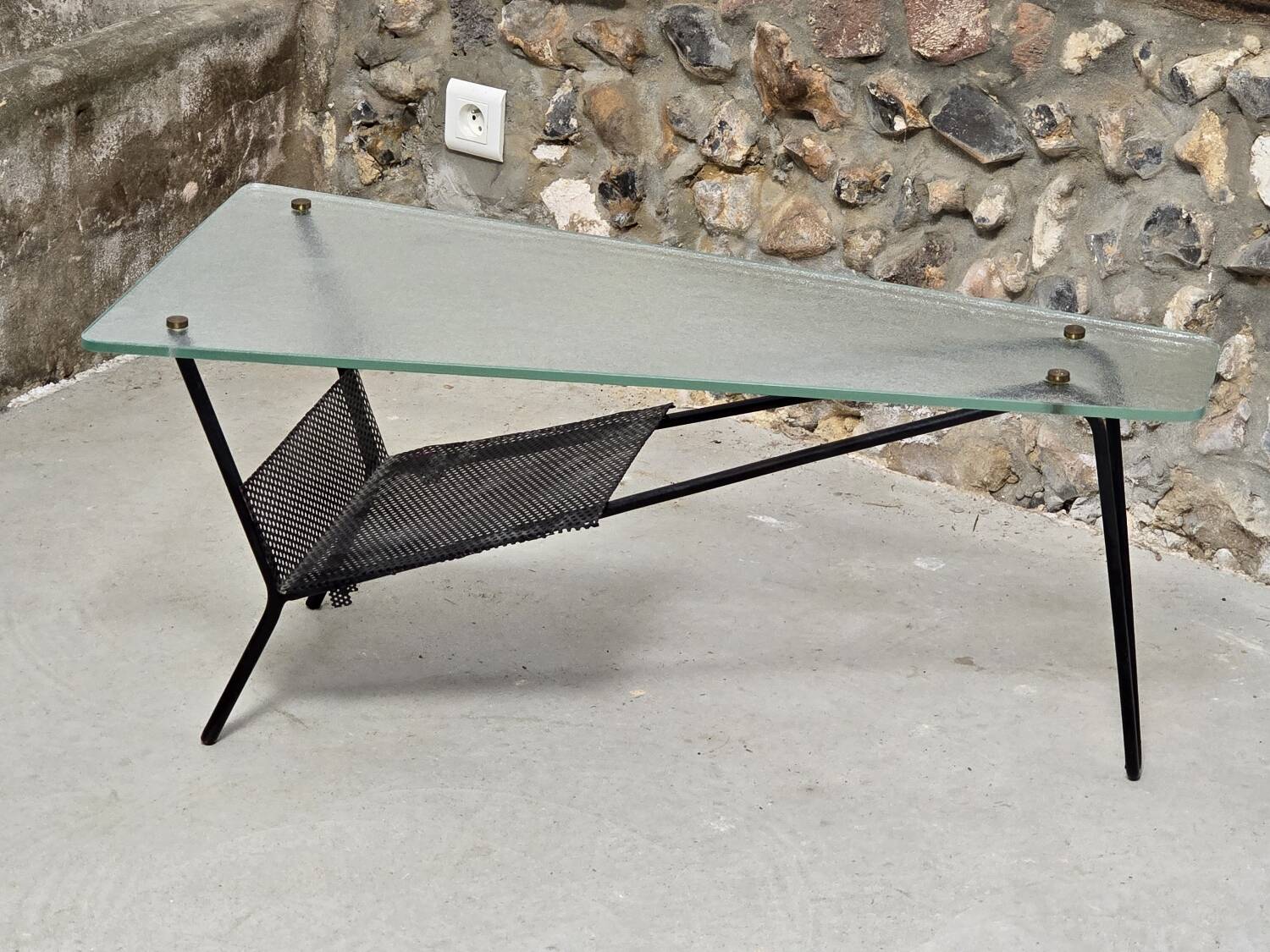 Coffee table in glass and black lacquered metal