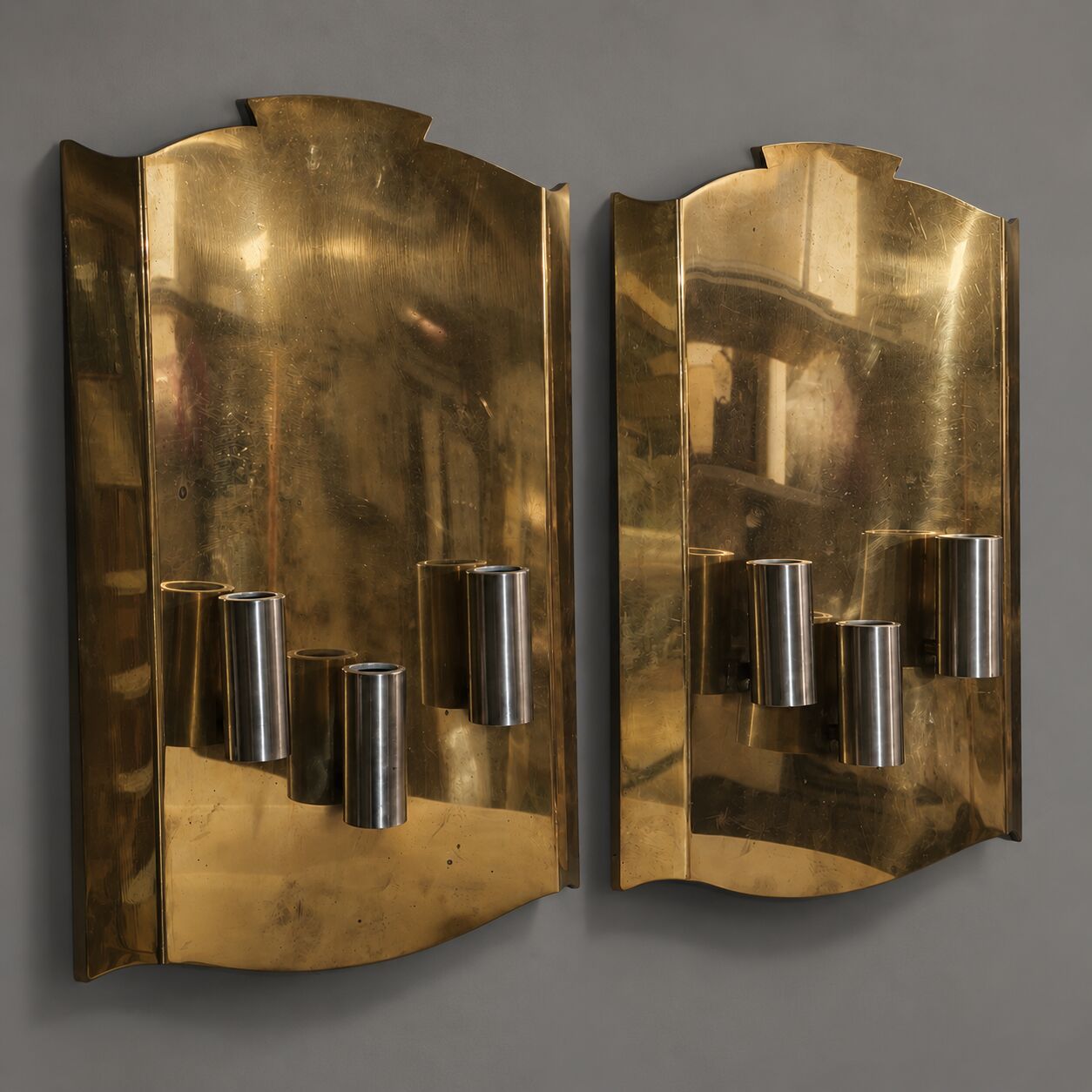 Pair of Scandinavian wall sconces in brass, circa 1930.