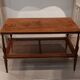 Coffee table / side table in mahogany with a rattan shelf.
