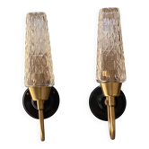 Pair of wall sconces in brass with square tulip glass shades.