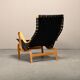 Fauteuil et pouf Bruno Mathsson Pernilla en bois de hêtre et sangles