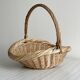 Large antique woven wicker basket with handle.