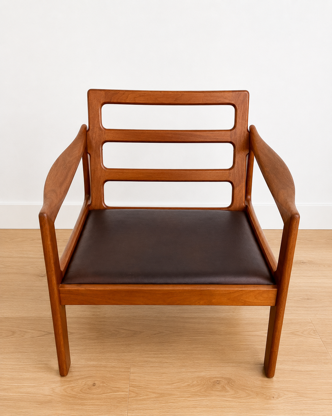 Vintage Danish Illum Wikkelsø teak lounge chair model 20