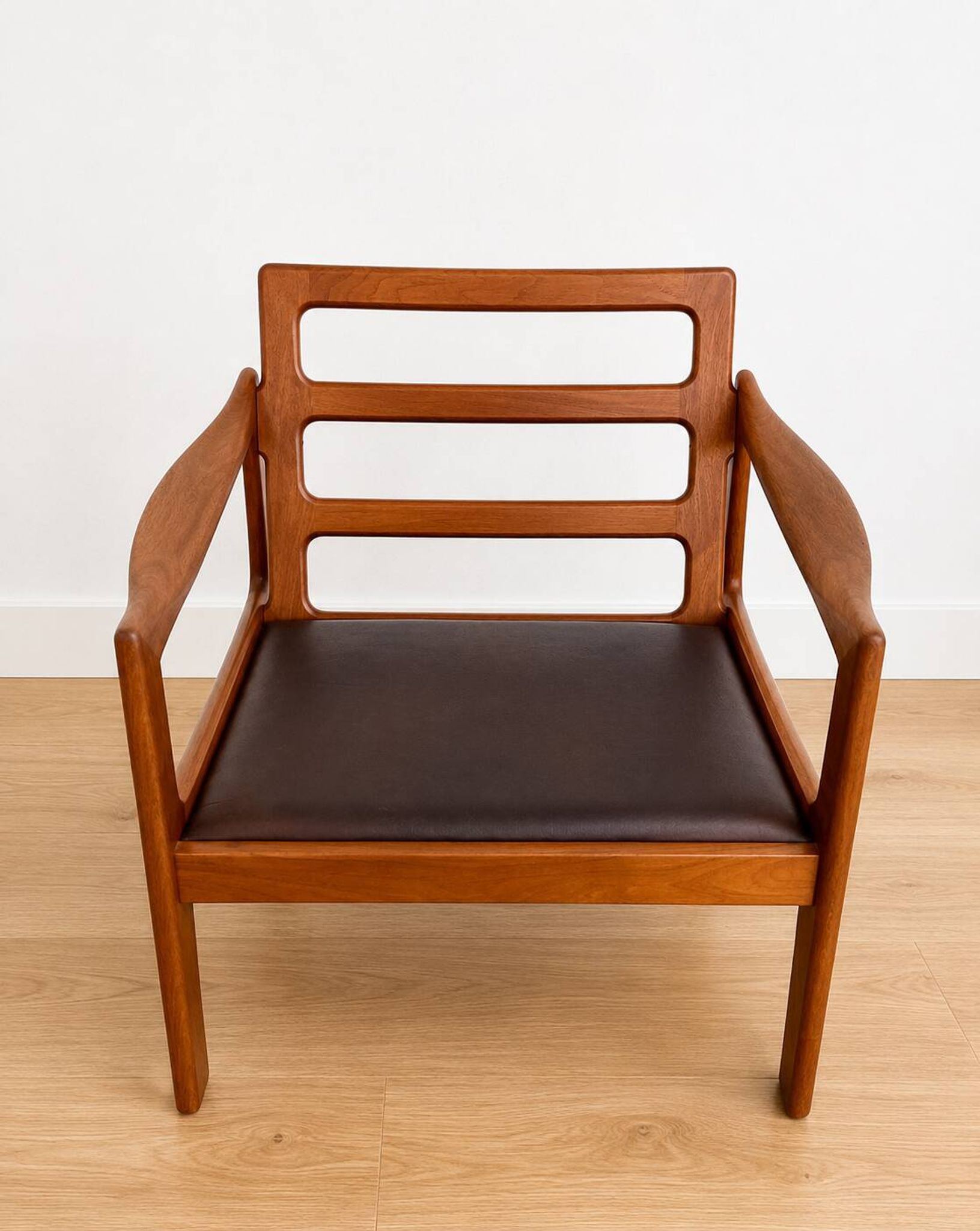 Vintage Danish Illum Wikkelsø teak lounge chair model 20