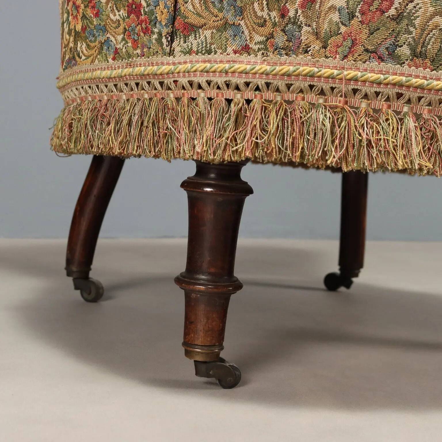 Victorian armchair with fabric pouf, England, 19th century.
