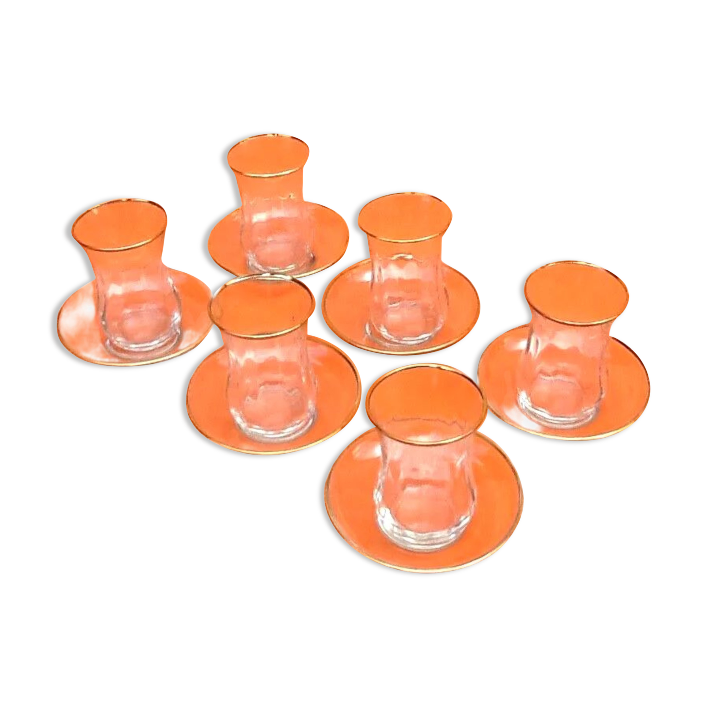 Transparent glass tea service with gilding.