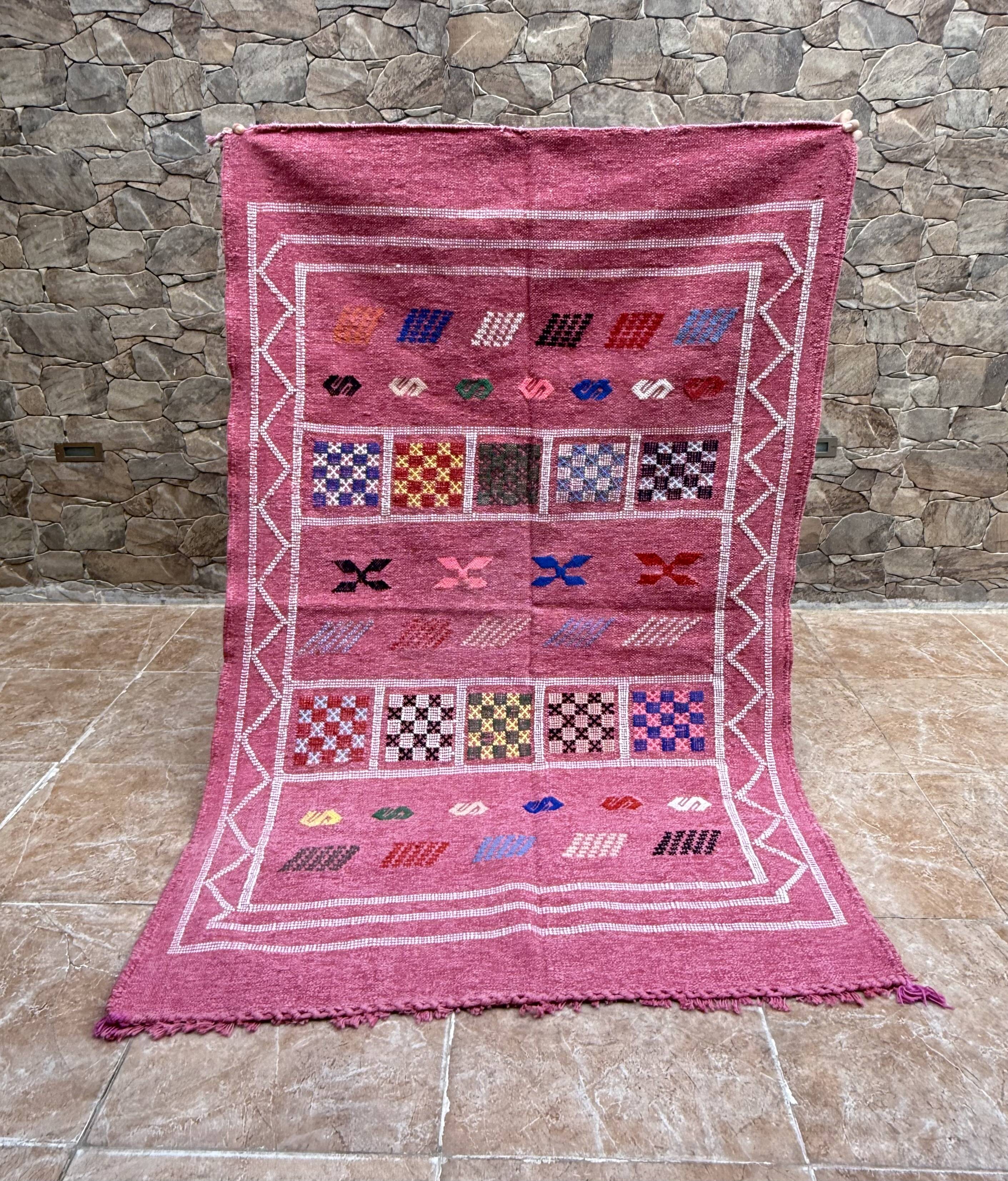 Handmade Moroccan wool rug: Berber Azilal style, geometric pattern.