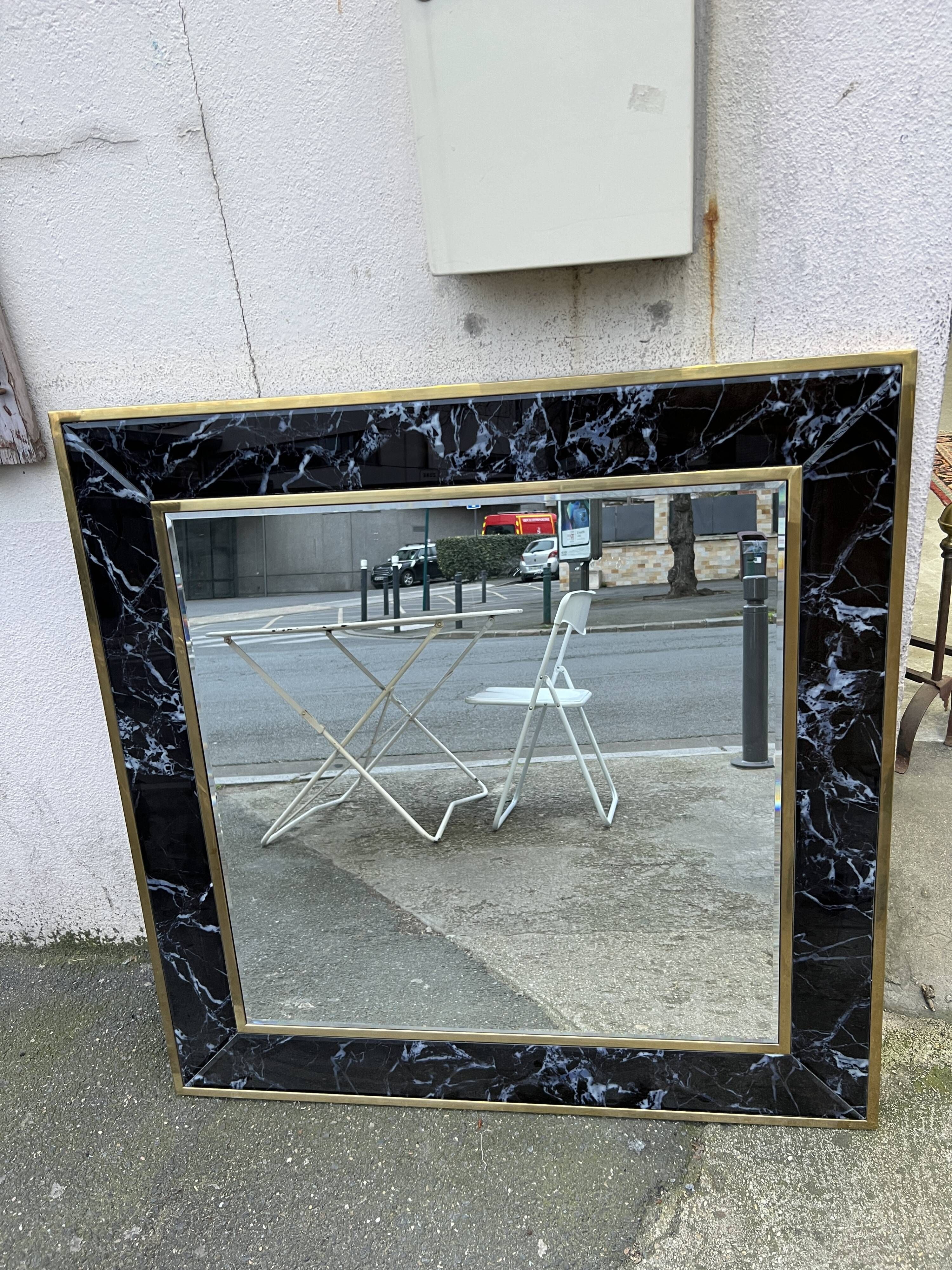 Mirror in brass and white veined black marble from the 70s