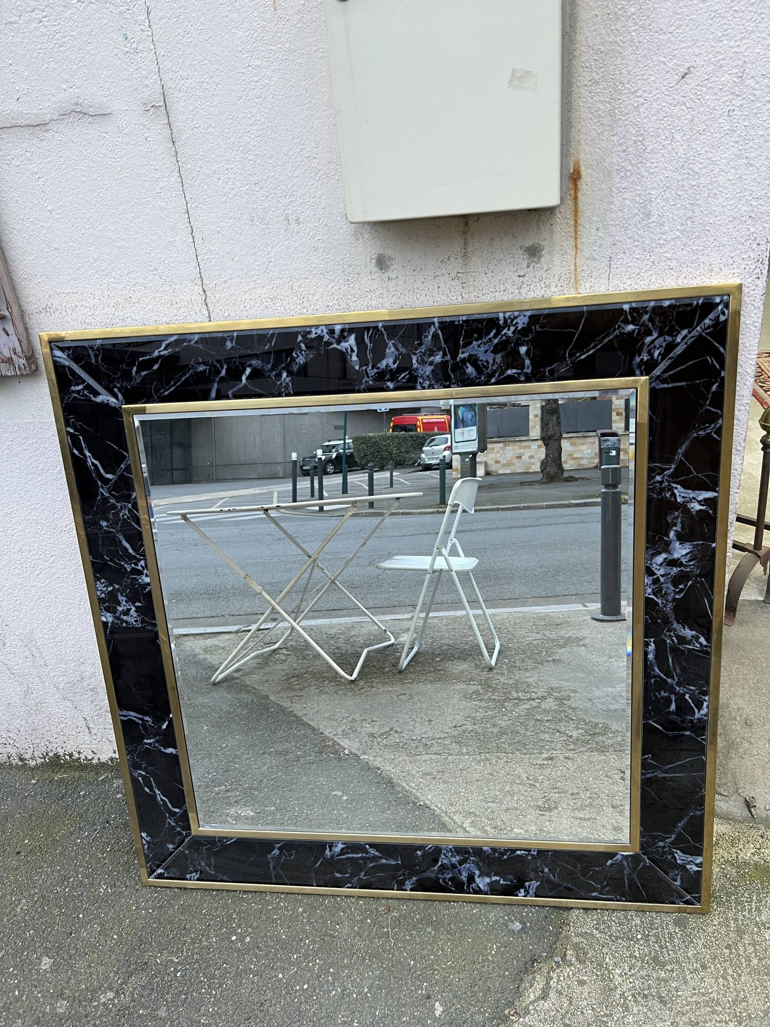 Mirror in brass and white veined black marble from the 70s