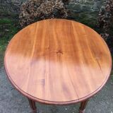Table ovale ancienne en cerisier pieds parapluie