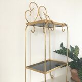 Shelf on feet in gold metal and black shelves