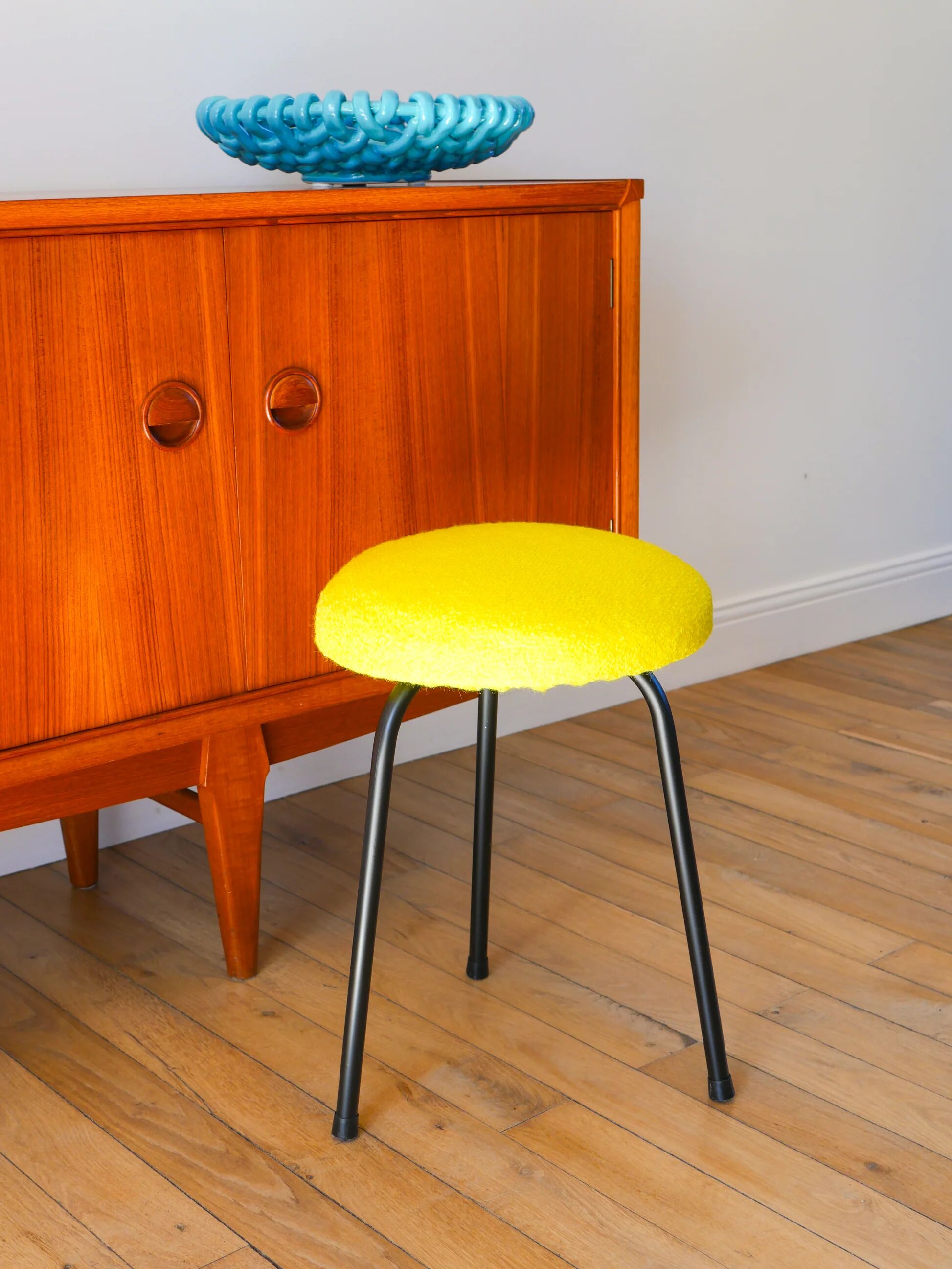Black iron tripod stool with boiled wool, yellow, 1960.