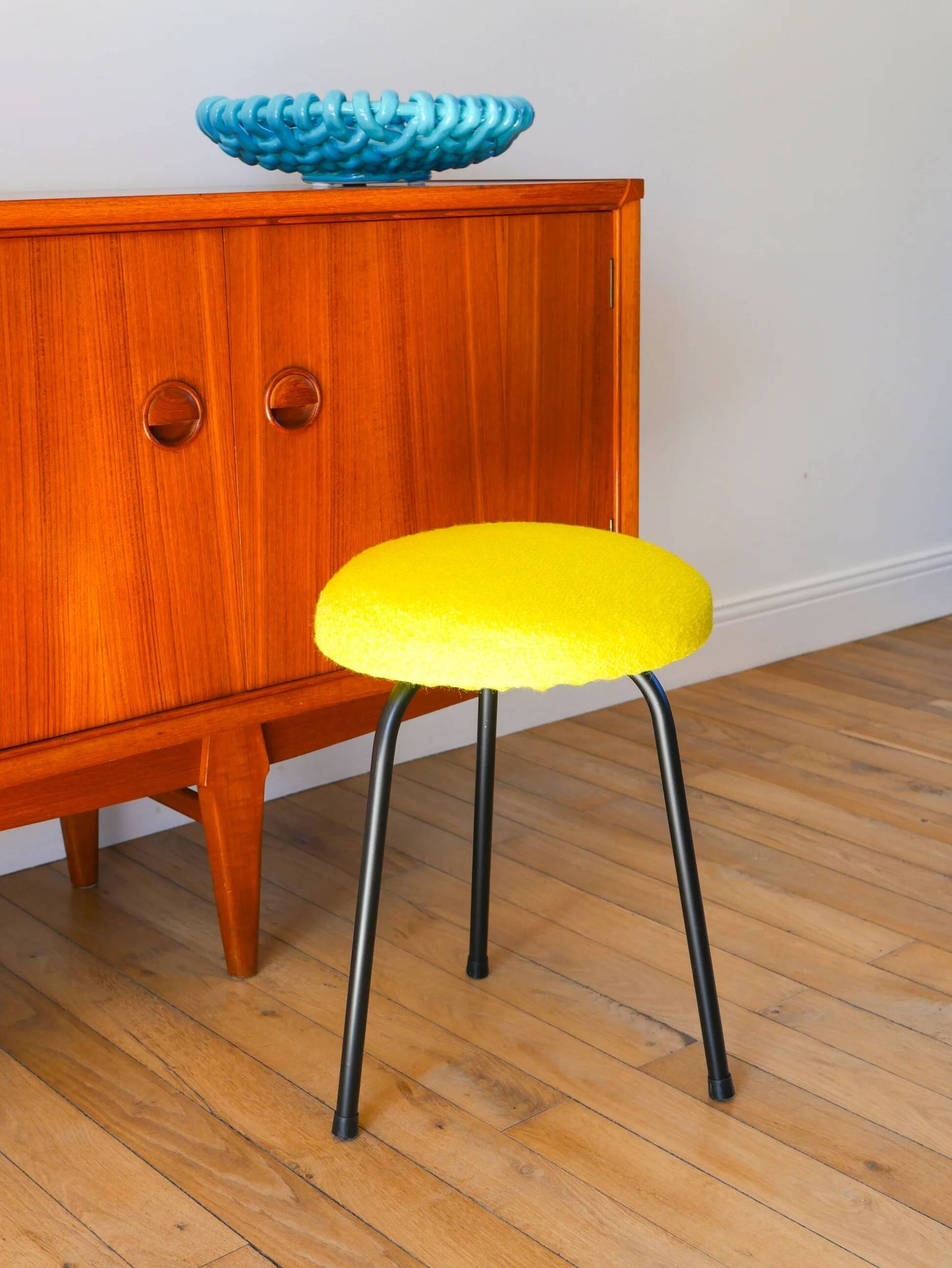 Black iron tripod stool with boiled wool, yellow, 1960.