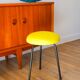Black iron tripod stool with boiled wool, yellow, 1960.
