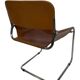 vintage dining room chair in cognac leather and chrome 1970s Italy