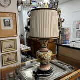 A pair of lamps with a pleated couture lampshade in wild silk