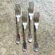 4 silver-plated forks
