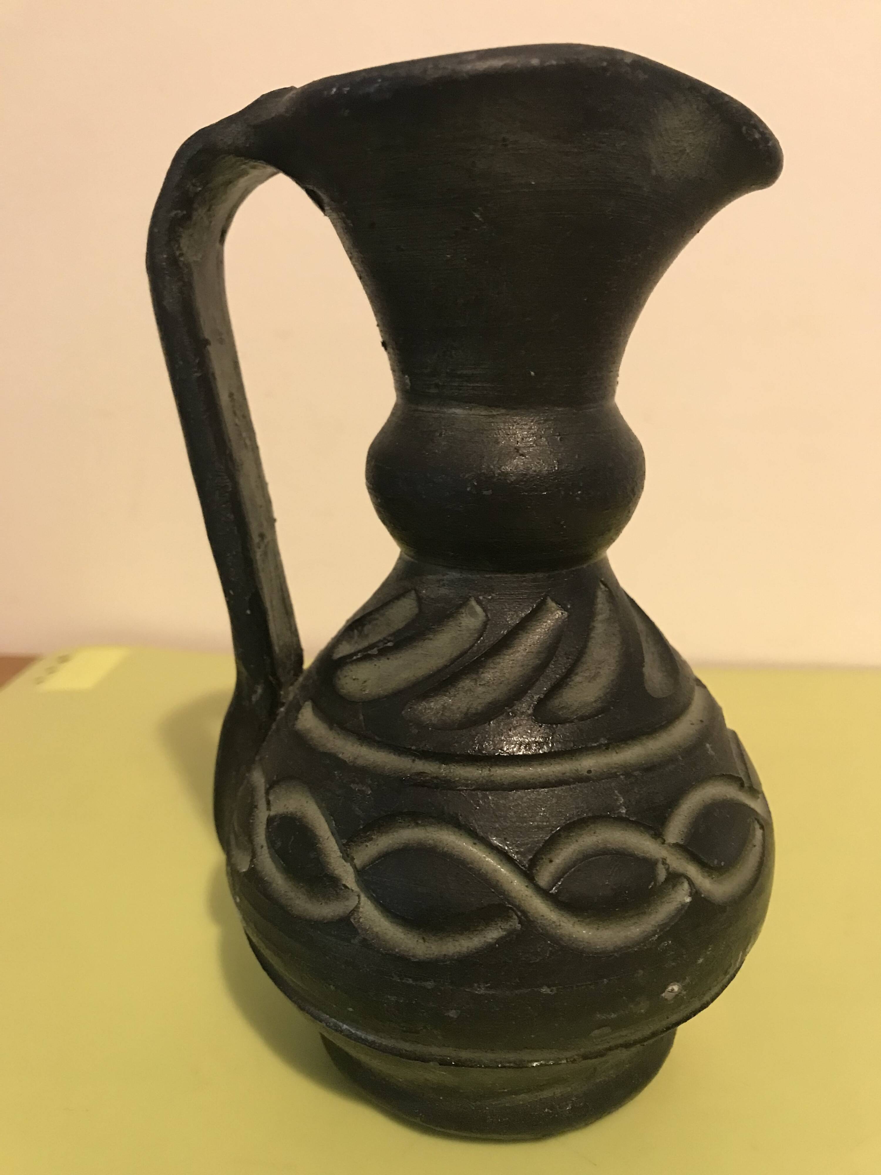 Small antique jug